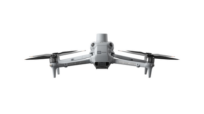 Gray drone with four propellers on a white background
