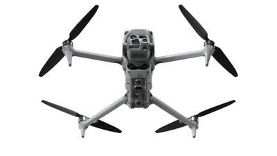 Grey drone with propellers on a white background - DJI M4T Shot from Buttom